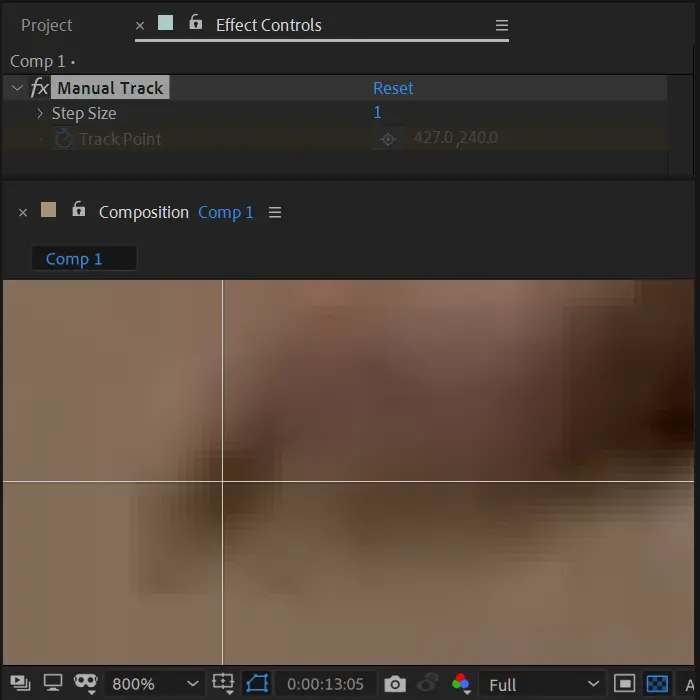 The manual track interface and a crosshair on a blurry object in the composition panel